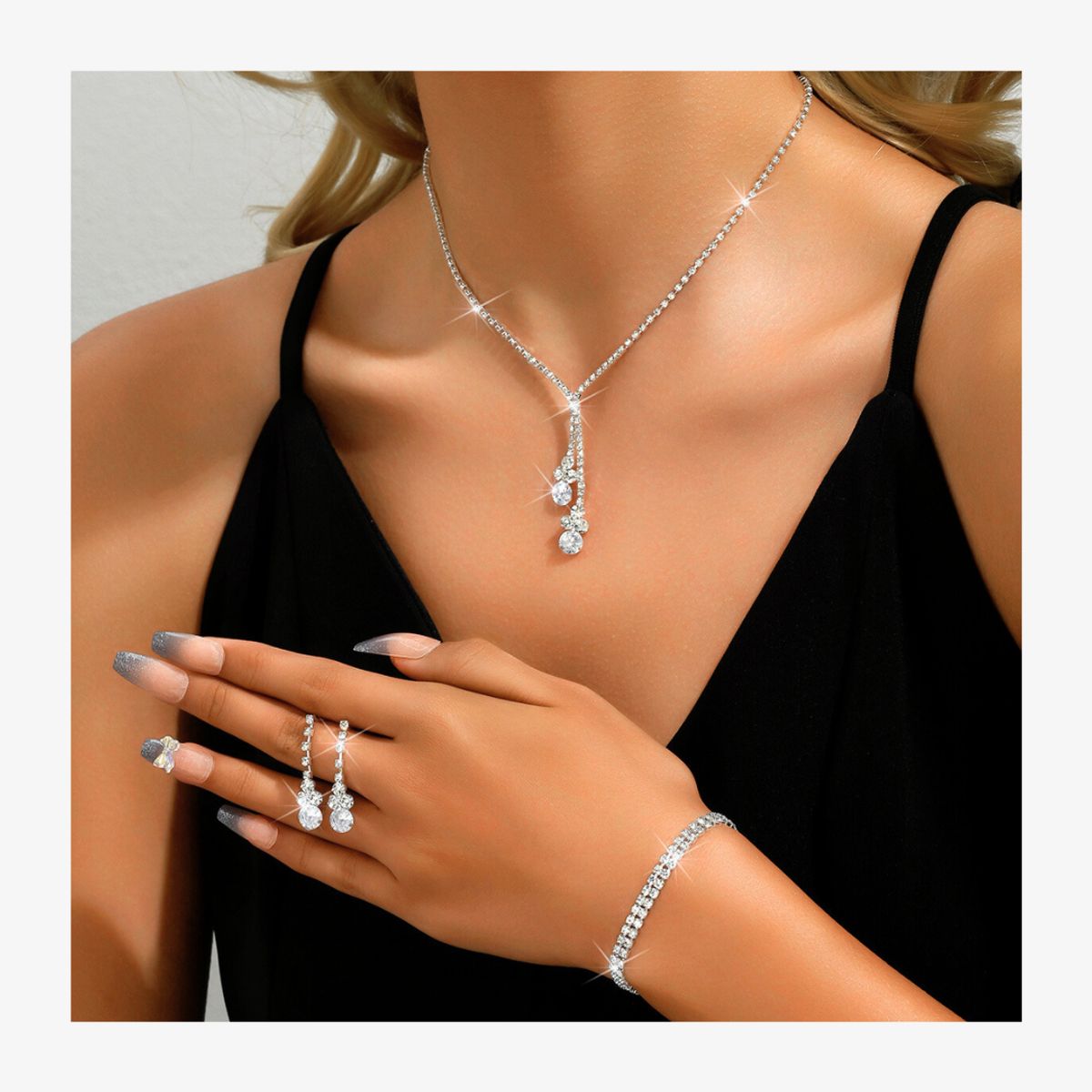 KAST PE - Set de Collar Aretes y Pulsera Evania - Plateado