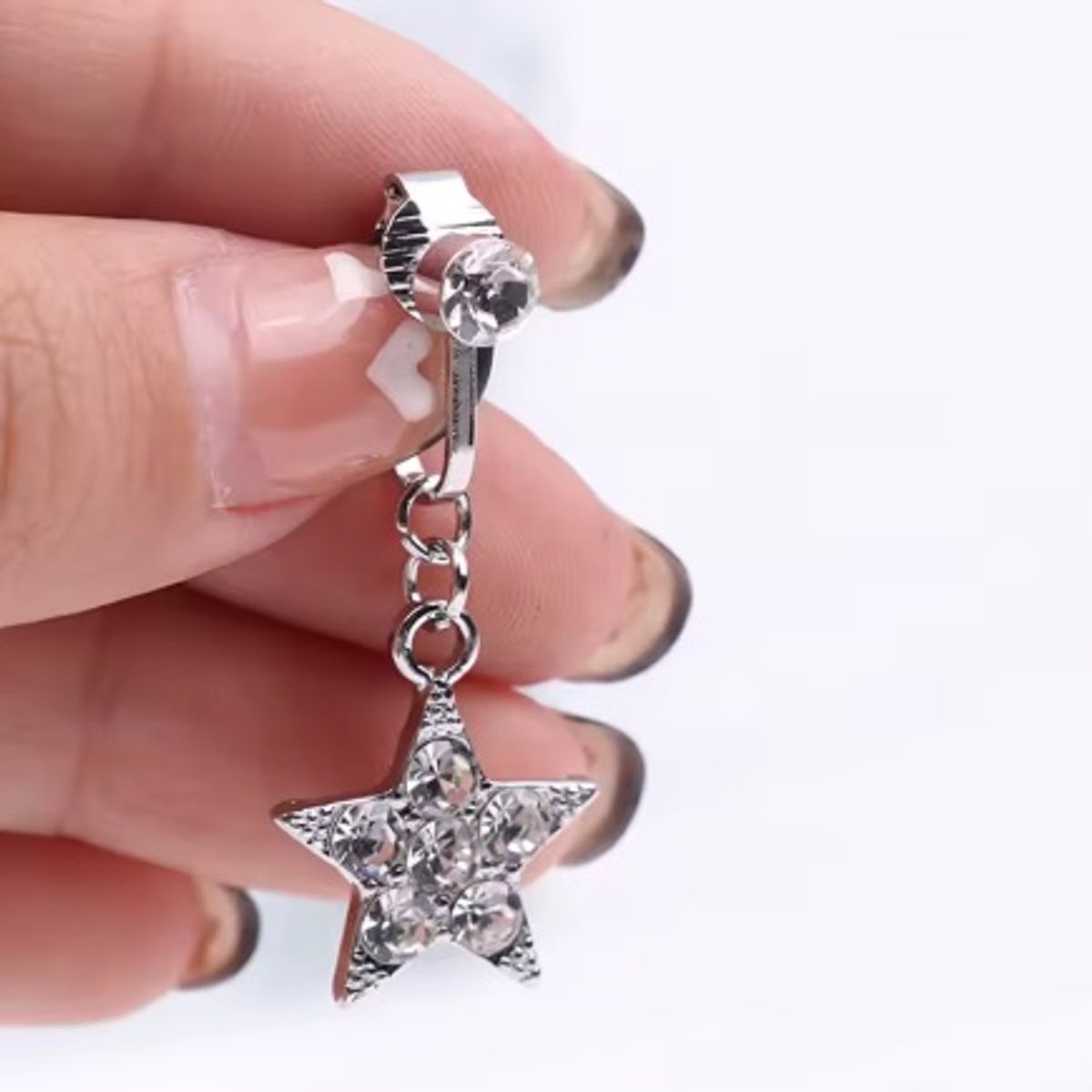 GENERICO - Piercing a presión falso para ombligo estrella plateada con brillos