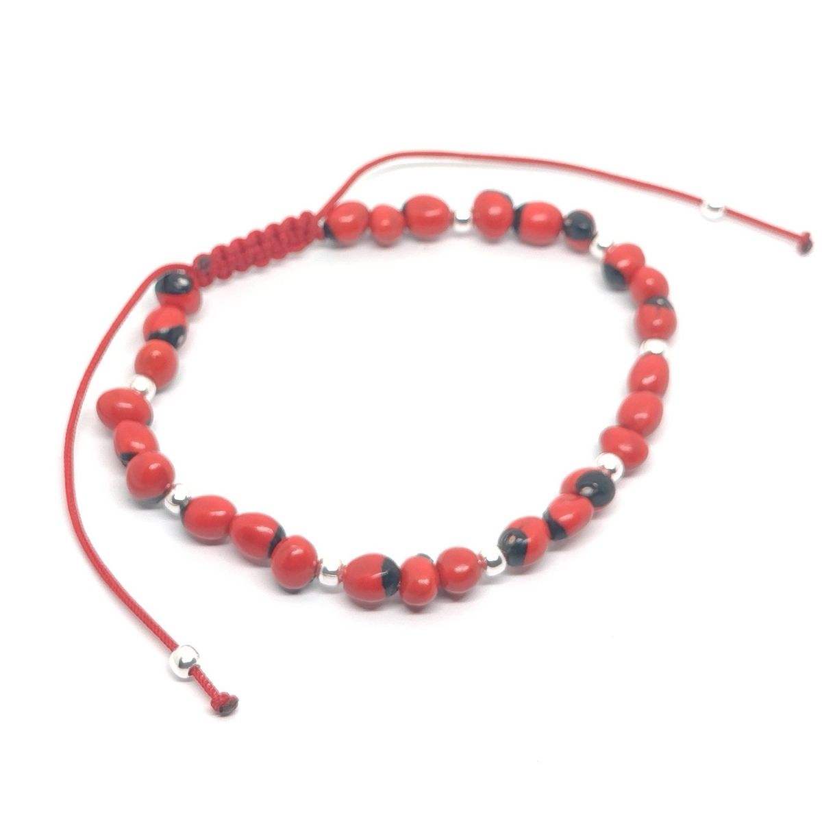 FERNANDA ROMERO JOYAS Y ACCESORIOS - PULSERA HUAYRURO TEJIDA CUENTAS DE ACERO - HILO ROJO PROTECCION