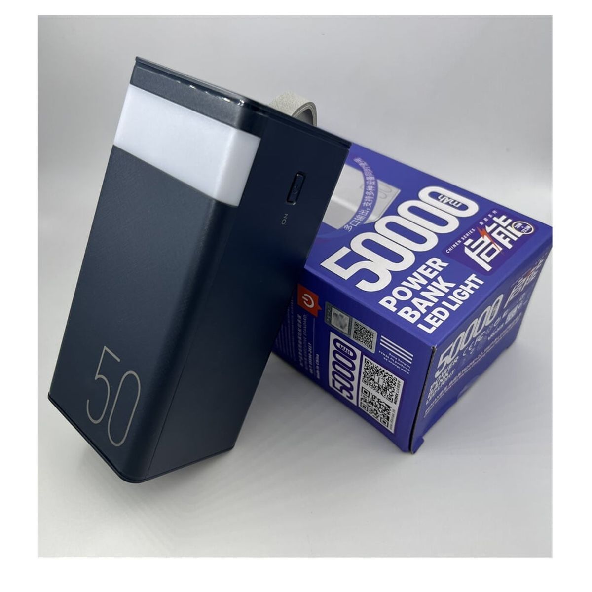 REMAX - CARGADOR PORTÁTIL REMAX LUZ LED 50000mAh PD20W+QC225W NEGRO