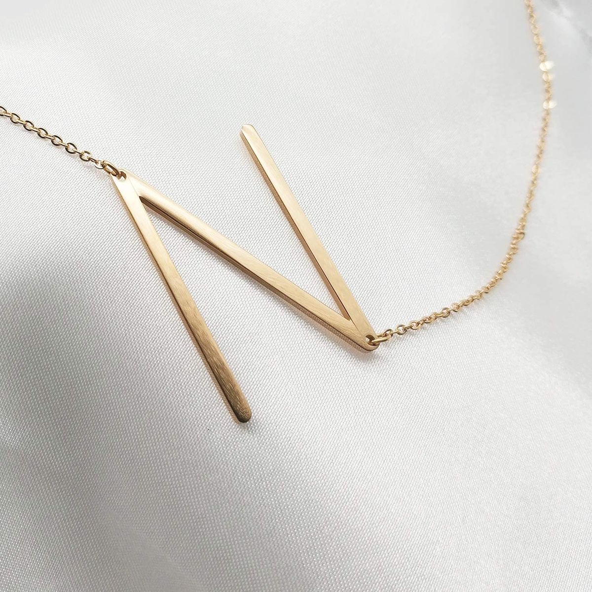 GENERICO - Collar con inicial en acero inoxidable N