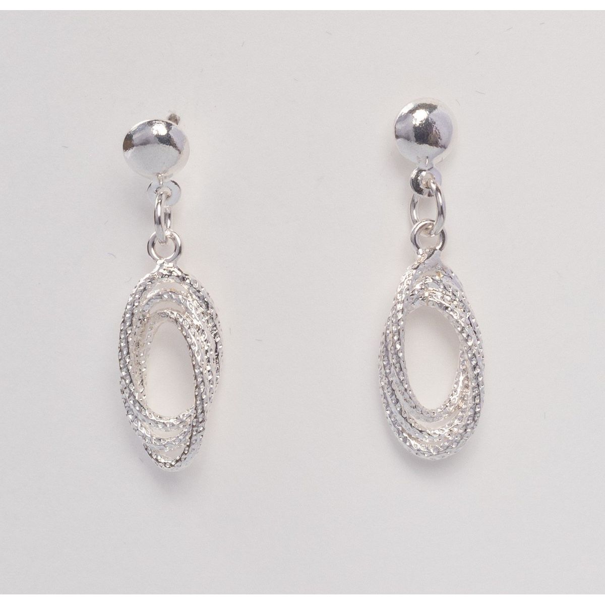 VANDRALA - ARETE DE PLATA TORBELLINO OVALADO CON DISEÑO