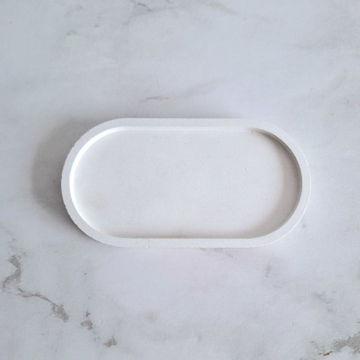 CONKRETE - Base decorativa de cemento forma ovalada 18 x 9 cm