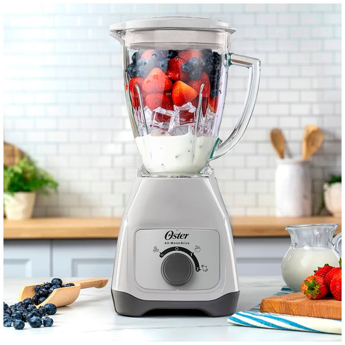 OSTER - Licuadora Oster con vaso de vidrio y control de perilla BLSTKAGWRD + Cuchilla