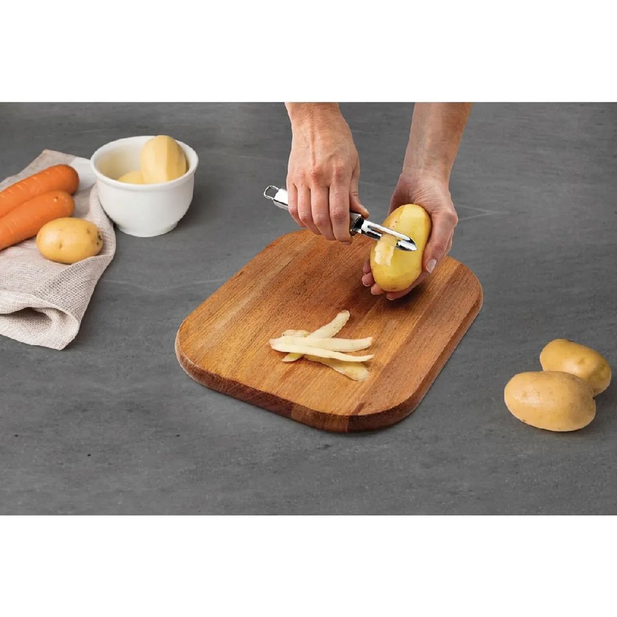 TRAMONTINA - Pelador de papas Marffim de acero inoxidable Tramontina 63809560