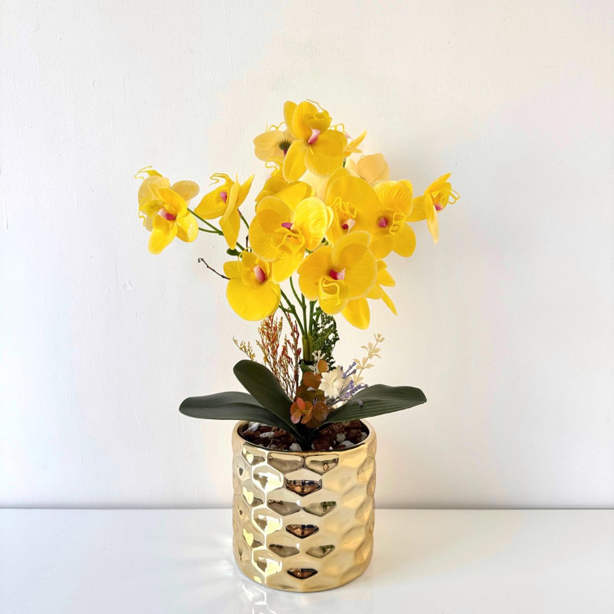 GENERICO - ORQUIDEAS AMARILLAS BASE DORADA CROMADA 45X20