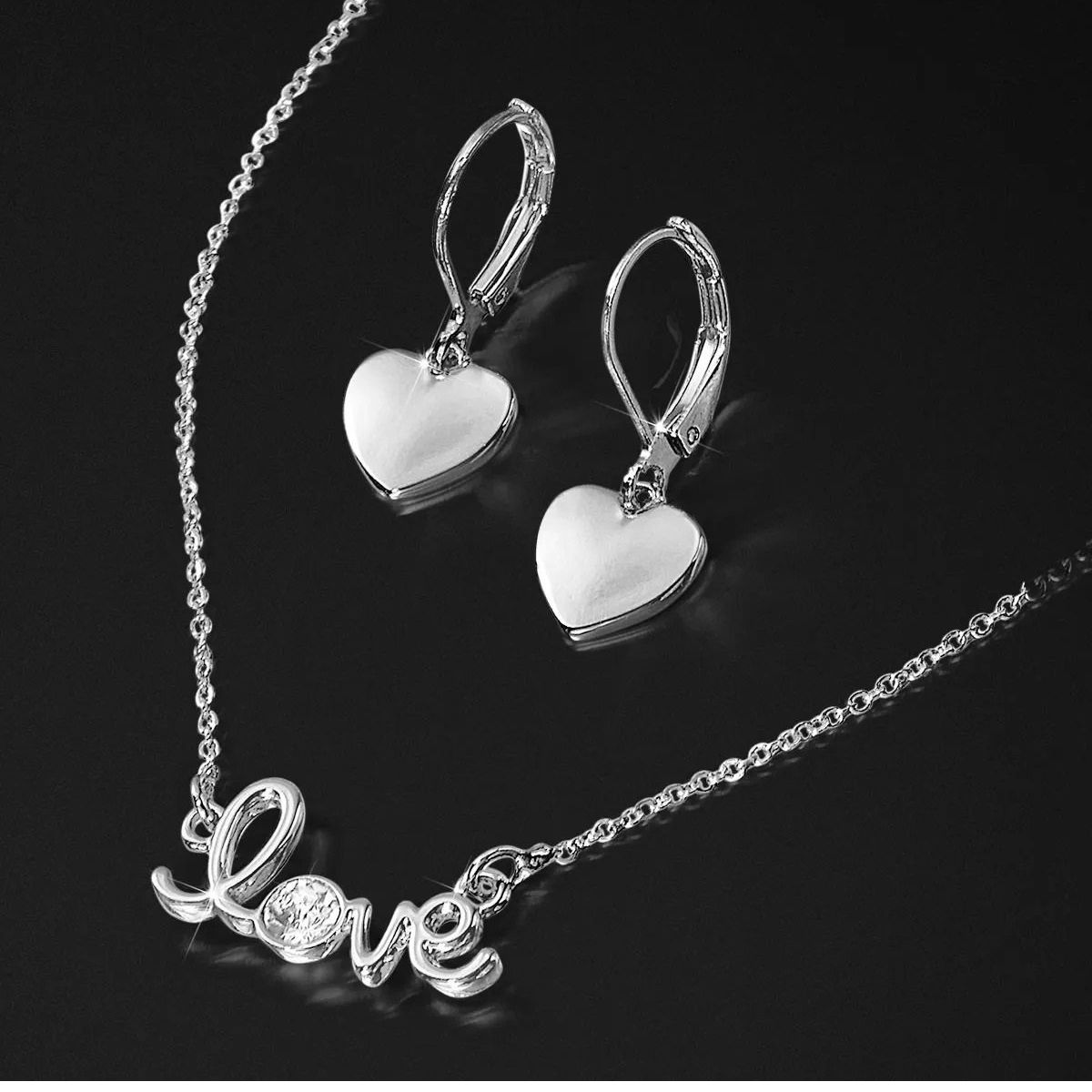 ESIKA - SET DE COLLAR Y ARETES LOVING SILVER  ESIKA