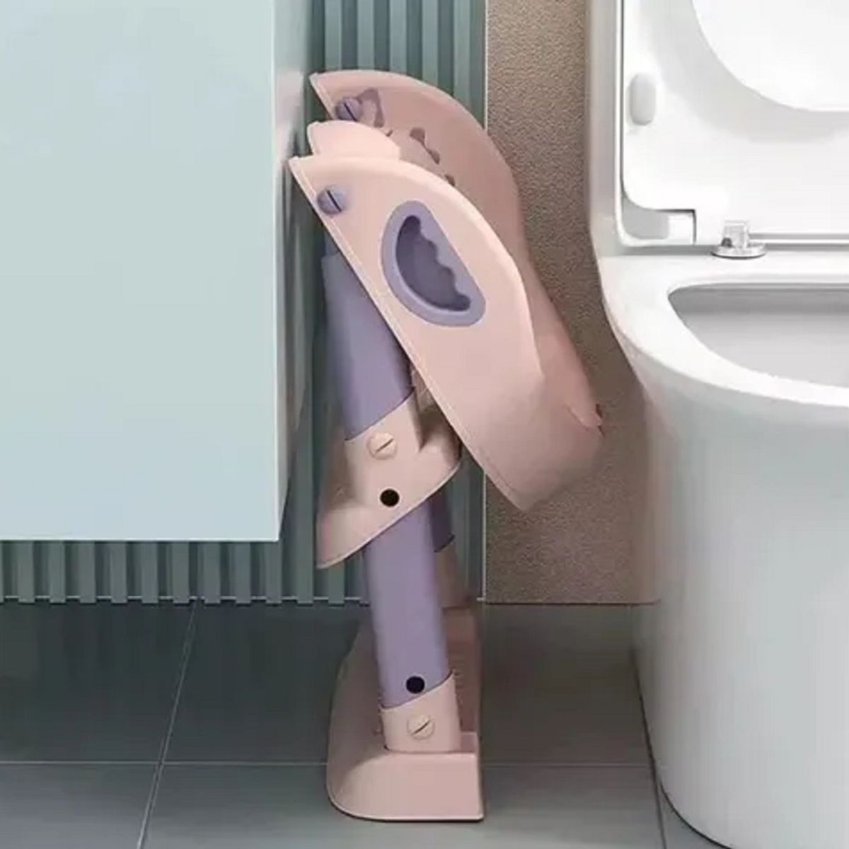 GENERICO - ASIENTO ESCALERA PARA INODORO CON OREJAS PLEGABLE ROSADO