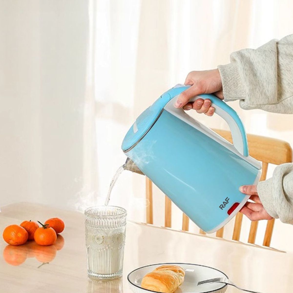 RAFF - HERVIDOR ELÉCTRICO DE ACERO INOXIDABLE 1500W  2.5 LITROS - CELESTE