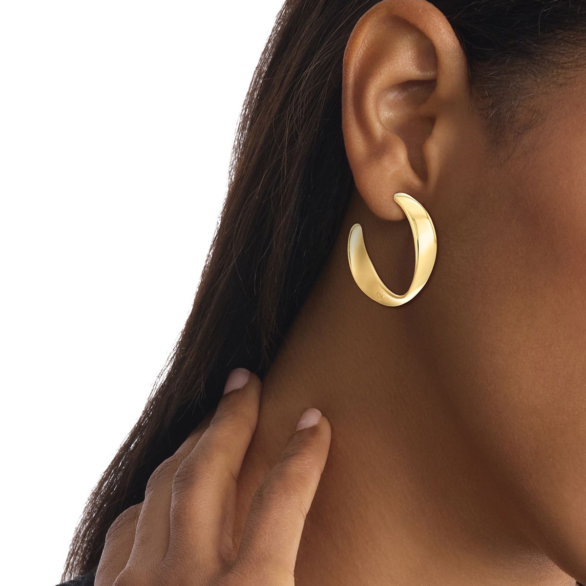 CALVIN KLEIN - Aretes de acero inoxidable dorado