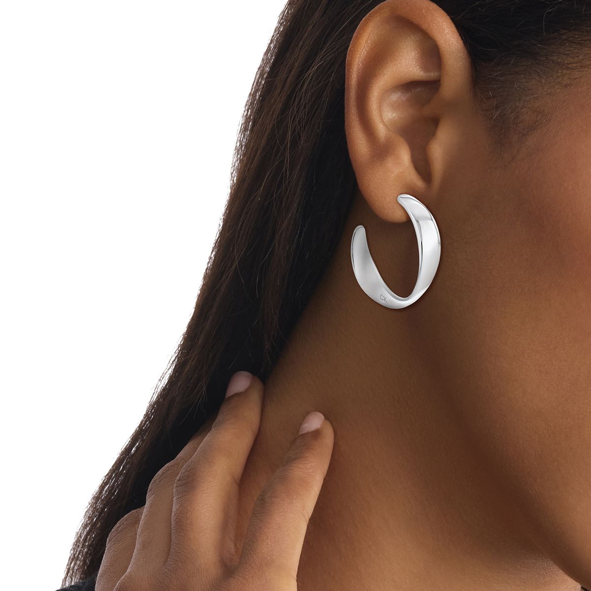 CALVIN KLEIN - Aretes de acero inoxidable plateado