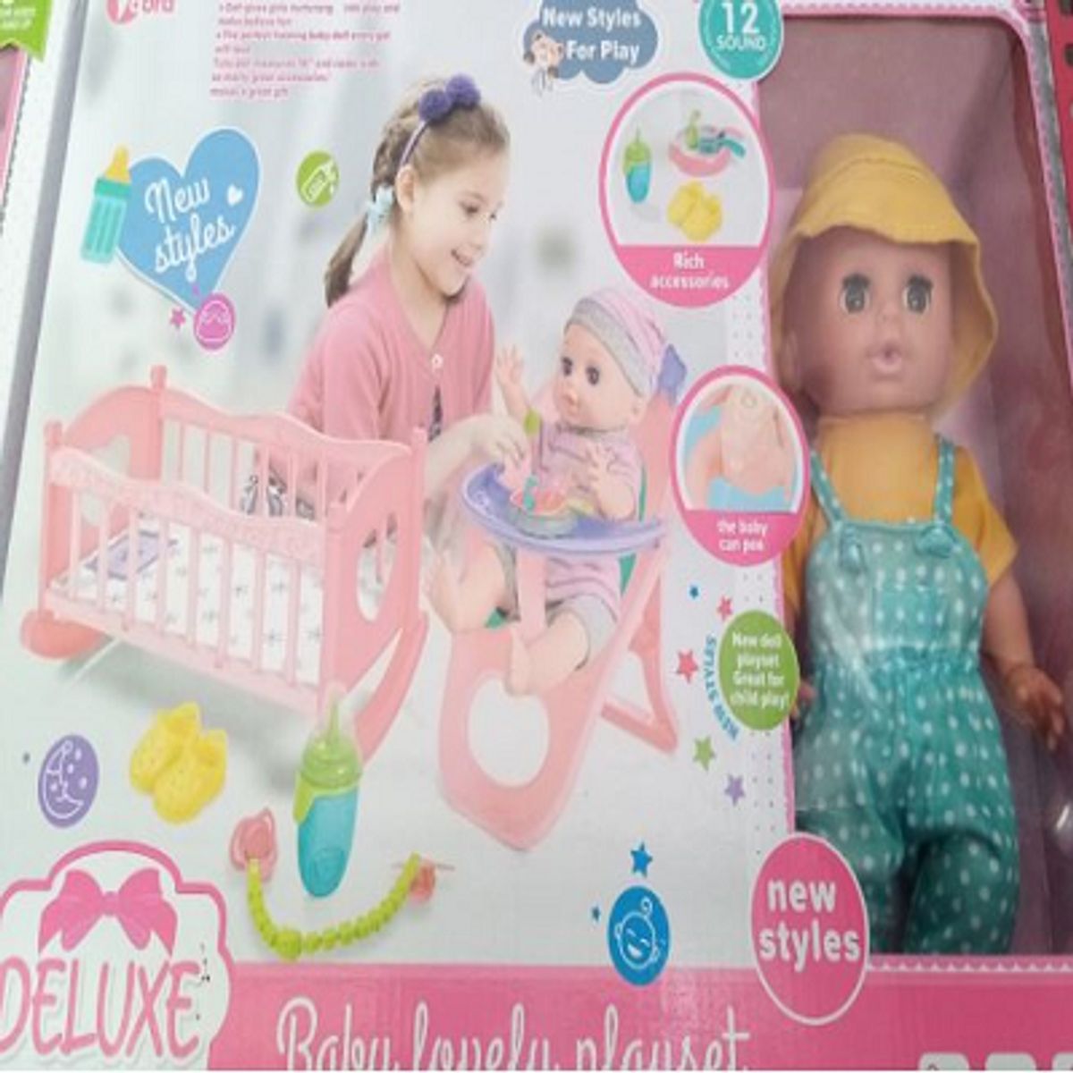 GENERICO - MUÑECA BABY  CON CUNA Y SILLA PARA COMER  CON OVEROL VERDE