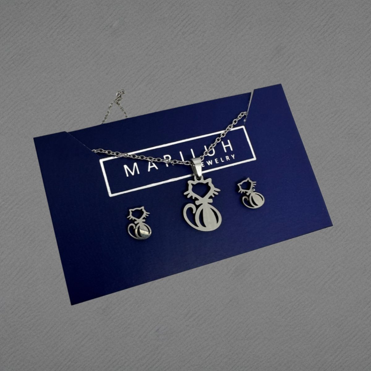 GENERICO - Pack Acero Collar con dije y Aretes - Silueta Gato Mod II Plateado