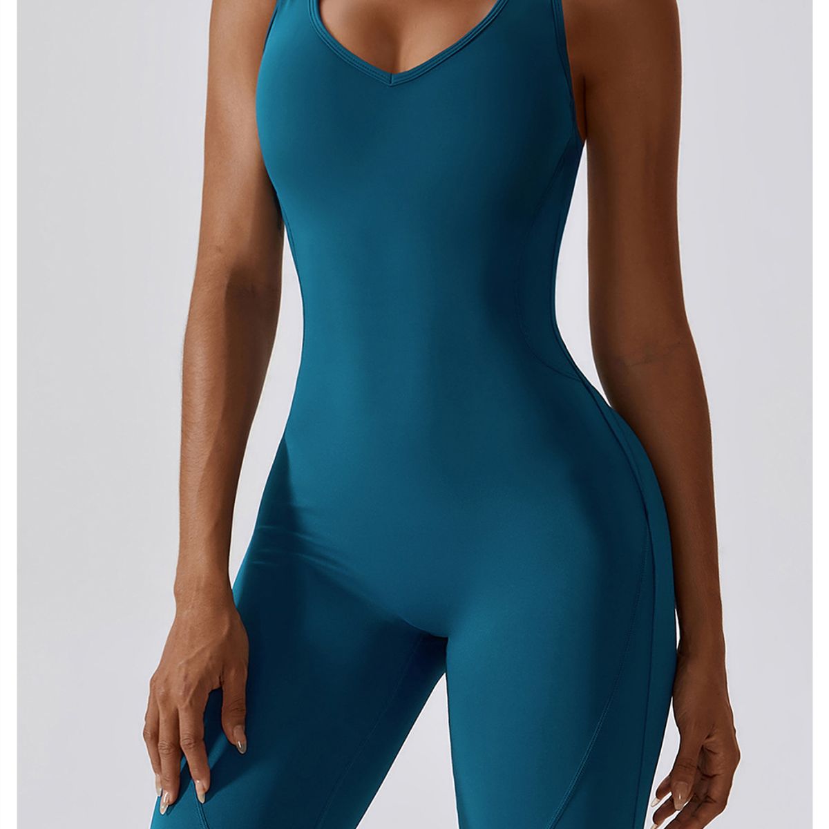 TIOZONEY - Mono deportivo sin mangas para mujer-Azul