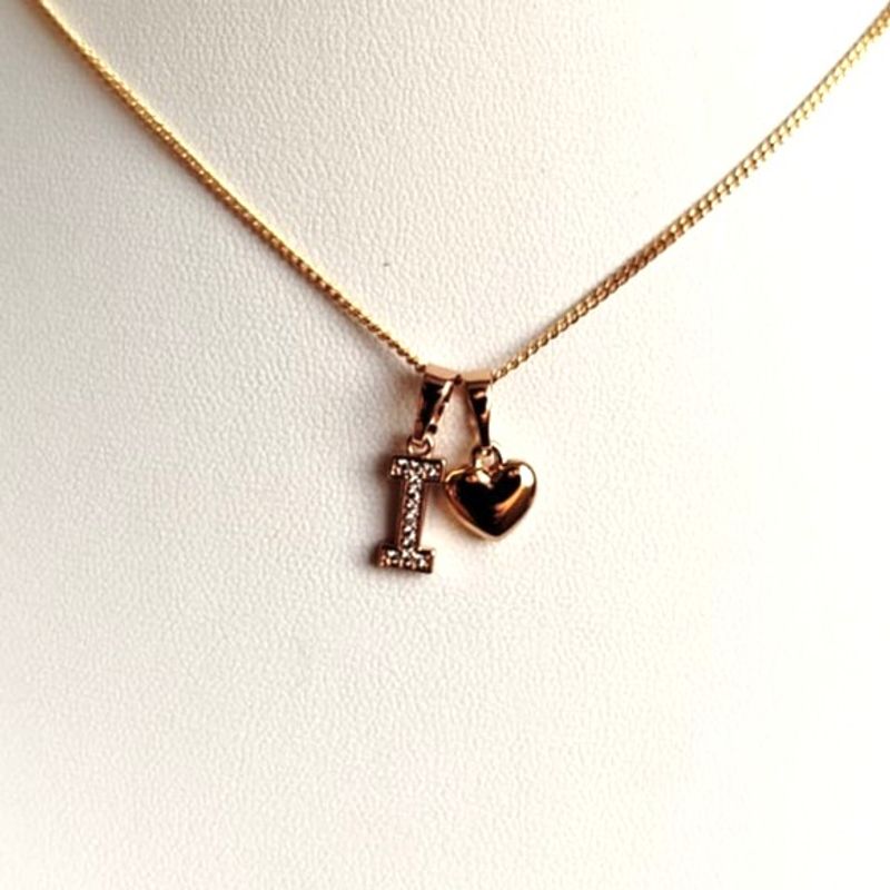 GENERICO - Collar Letra I + Corazon bañado en oro rosa 18 kilates