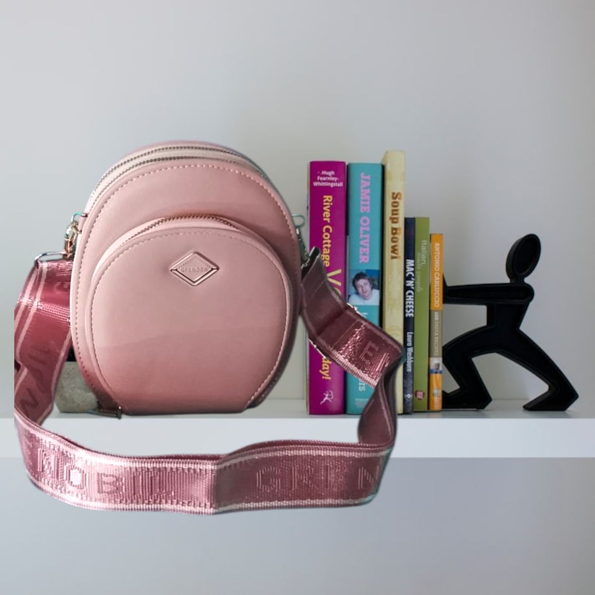 GENERICO - BOLSO PORTA CELULAR OVAL CON 3 COMPARTIMIENTOS ROSADO + LLAVERO DE REGALO