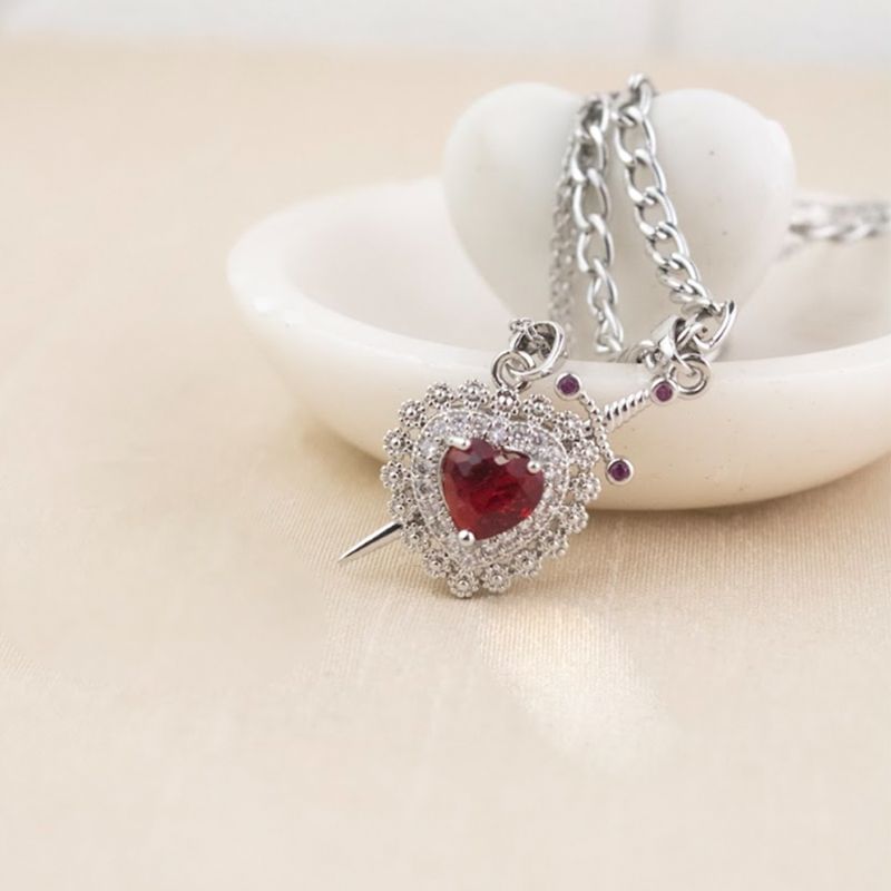 CLEO JOYAS & ACCESORIOS - Set Corazón y Espada Dorado Rosa Plateado Acero