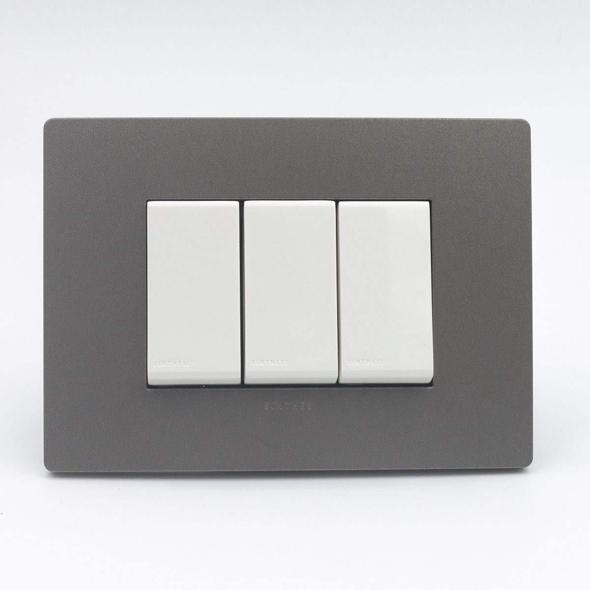 INTERRUPTOR TRIPLE 1 SIMPLE Y 2 CONMUTADOR 3 VIAS S33 PLACA PIEDRA, marca SINTHESI - Foto Principal