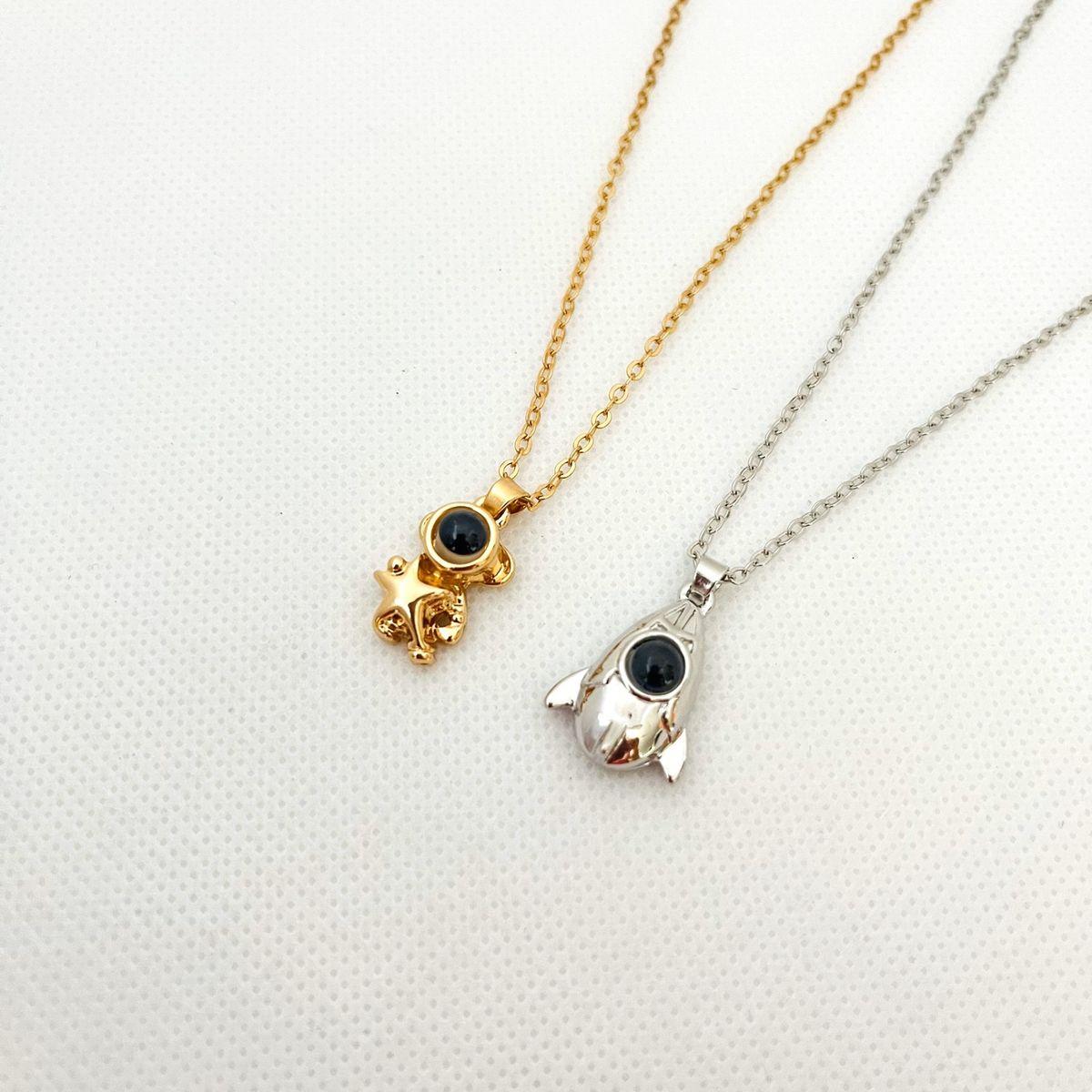 GENERICO - Collares Pareja Acero Astronauta y Nave 100 Idiomas Te amo