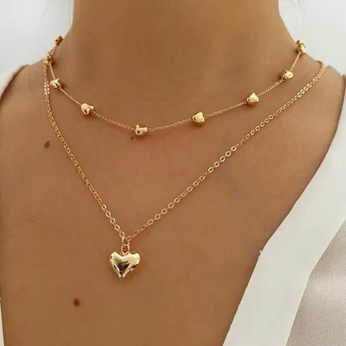 GENERICO - Collar y aretes modelo doble caida corazones