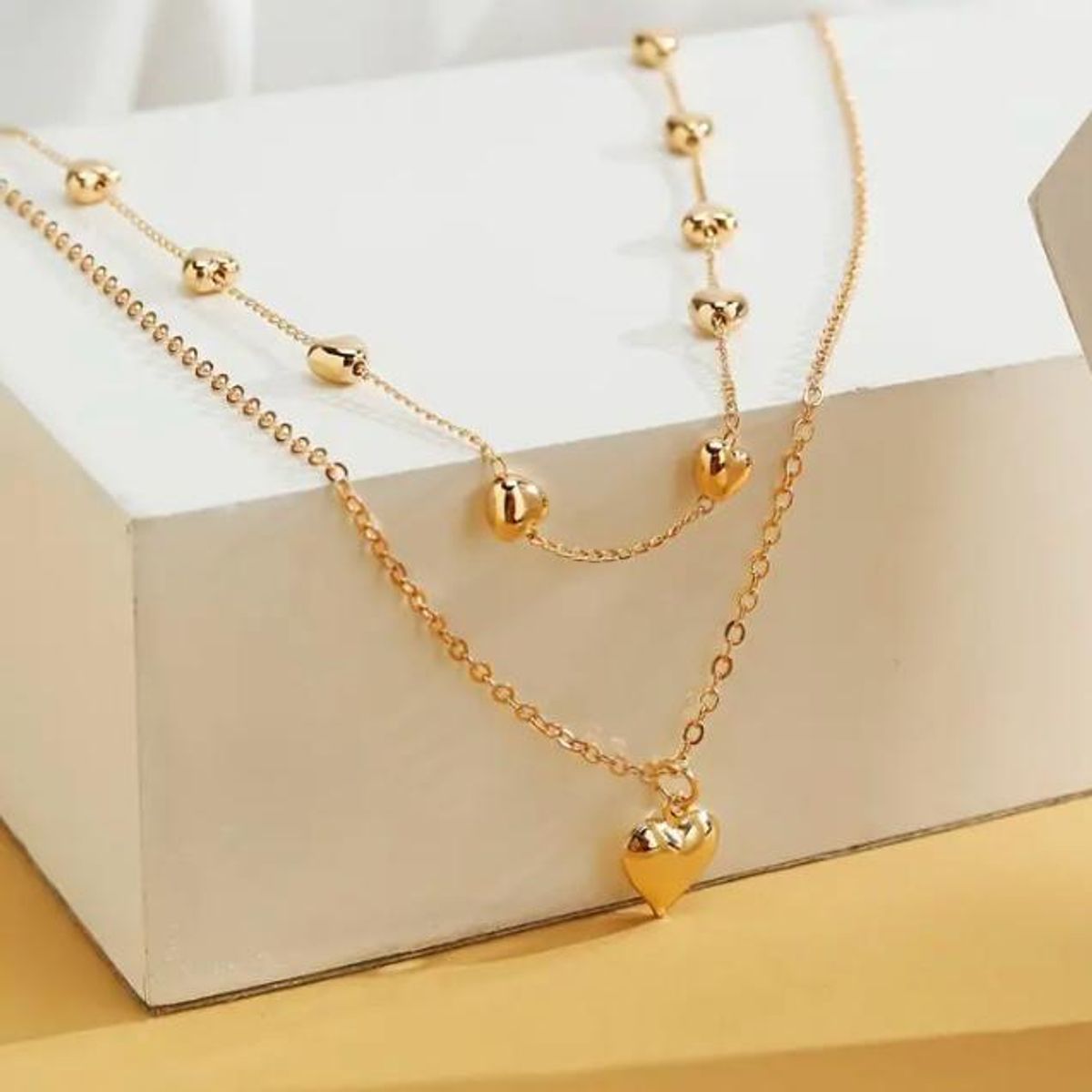 GENERICO - Collar y aretes modelo doble caida corazones