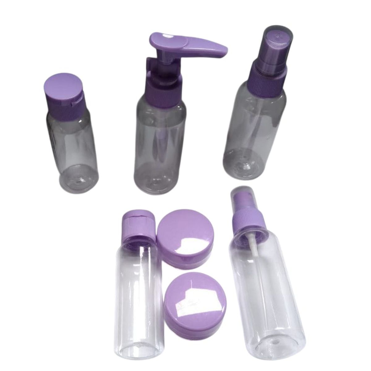GENERICO - SET DE 7 BOTELLAS / ENVASES DE VIAJE - LILA