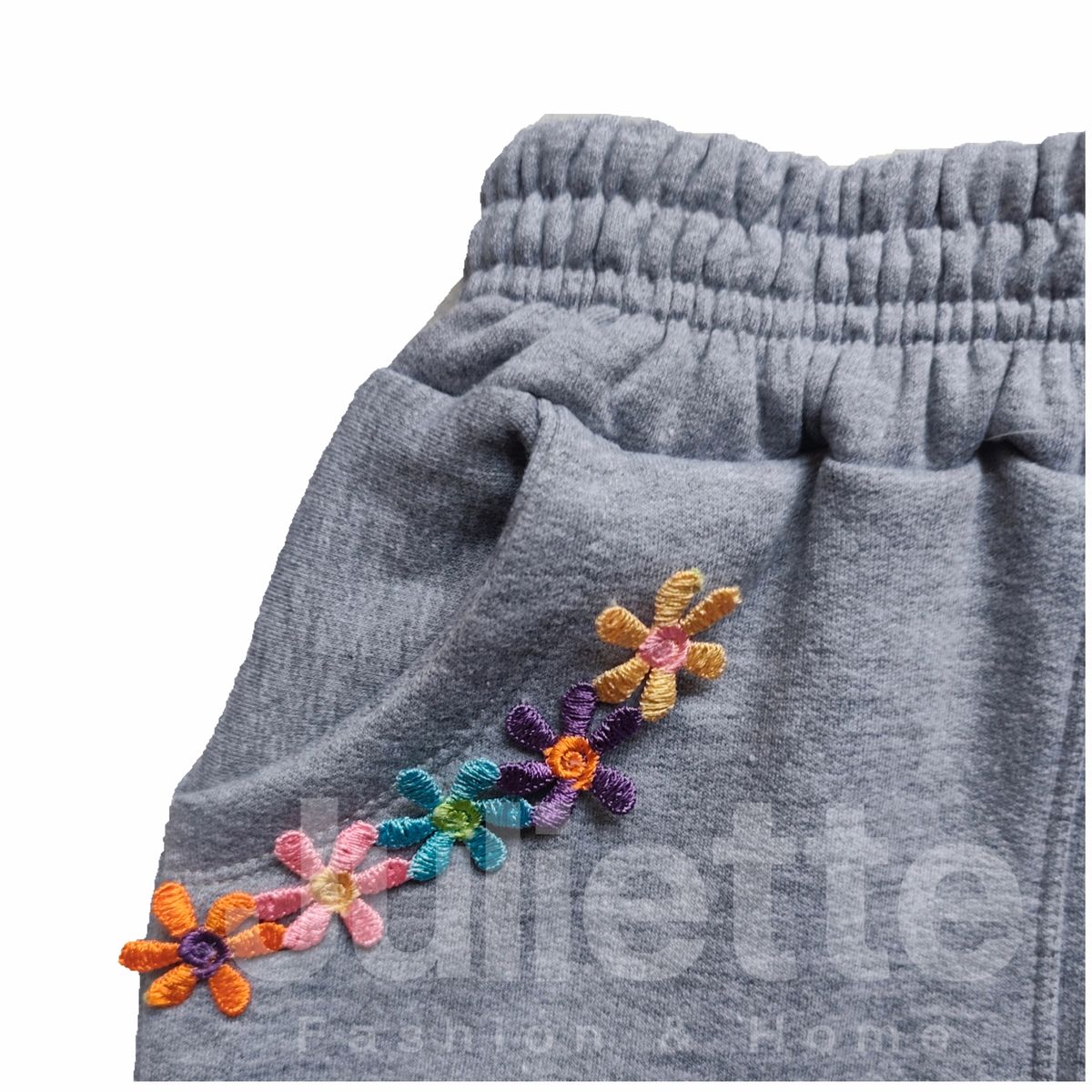 GENERICO - JOGGER BUZO FRANELA NIÑA DETALLE DE FLORES