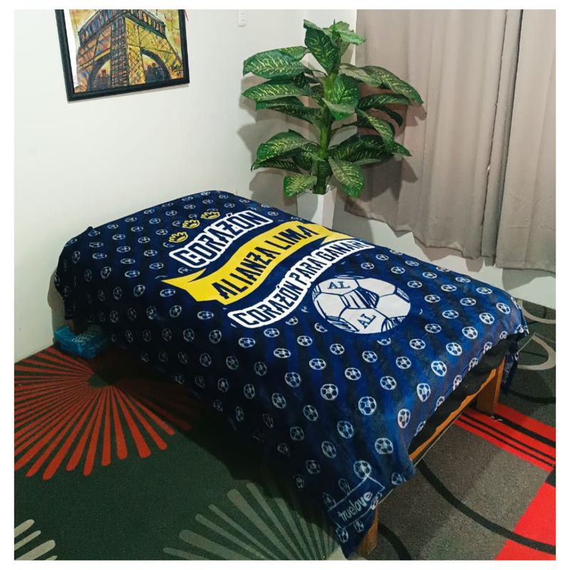 CUTE - MANTA  PIEL DE DURAZNO CON DISEÑO DEPORTIVO EN 2 PLAZAS