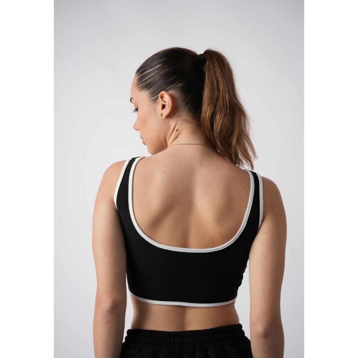 TWO OCEANS FITWEAR - Top Deportivo Mujer Con Escote V - Negro Con Contraste