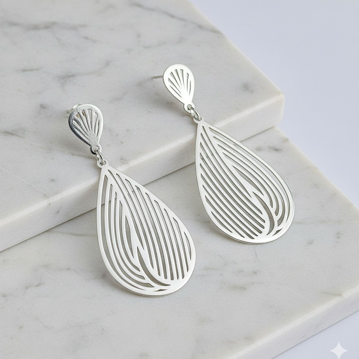 GENERICO - ARETES PLUMA EN PLATA