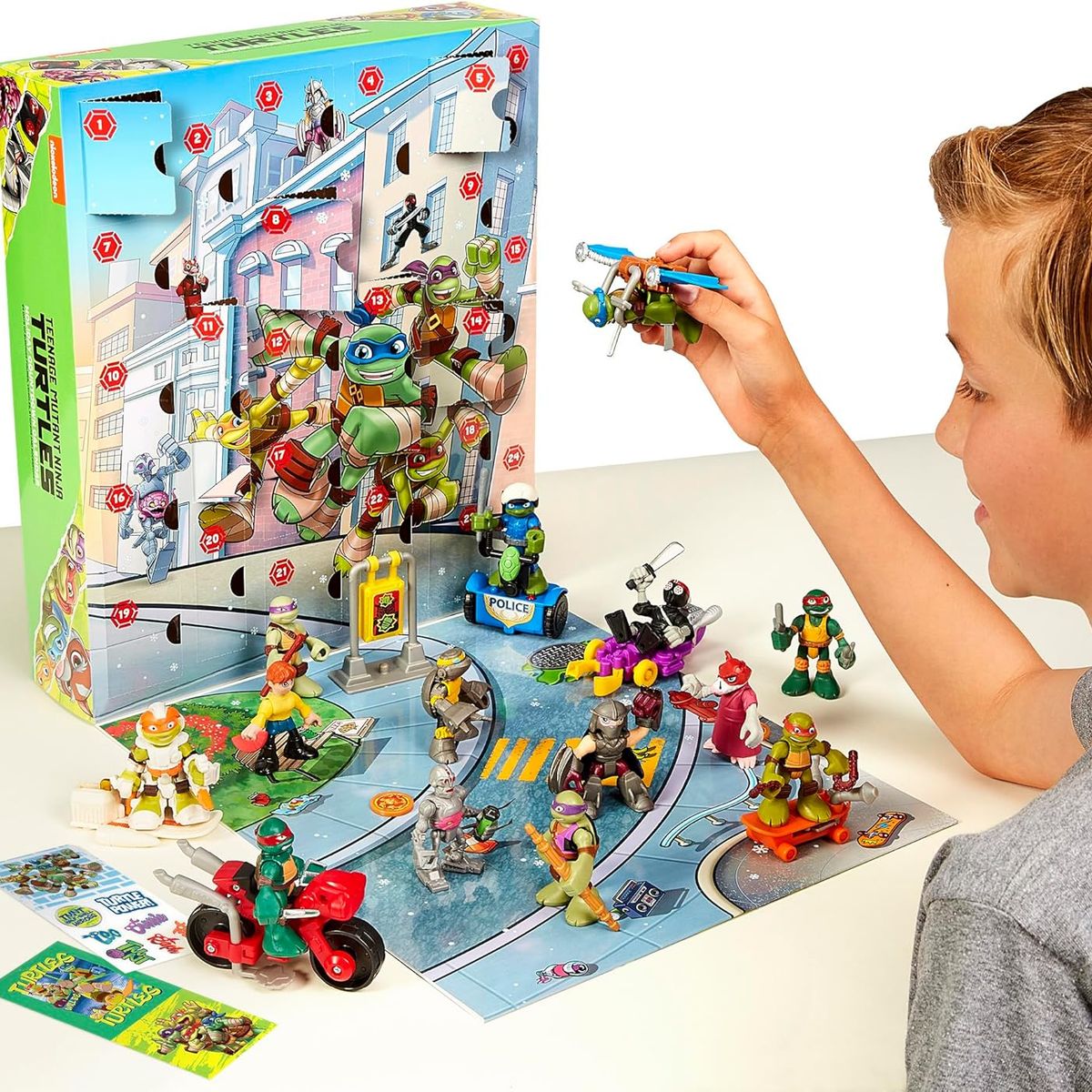 PLAYMATES TOYS - Calendario 24 Sorpresas TMNT – Tortugas Ninja Mutantes (14 Figuras + 6 Vehículos + Accesorios)