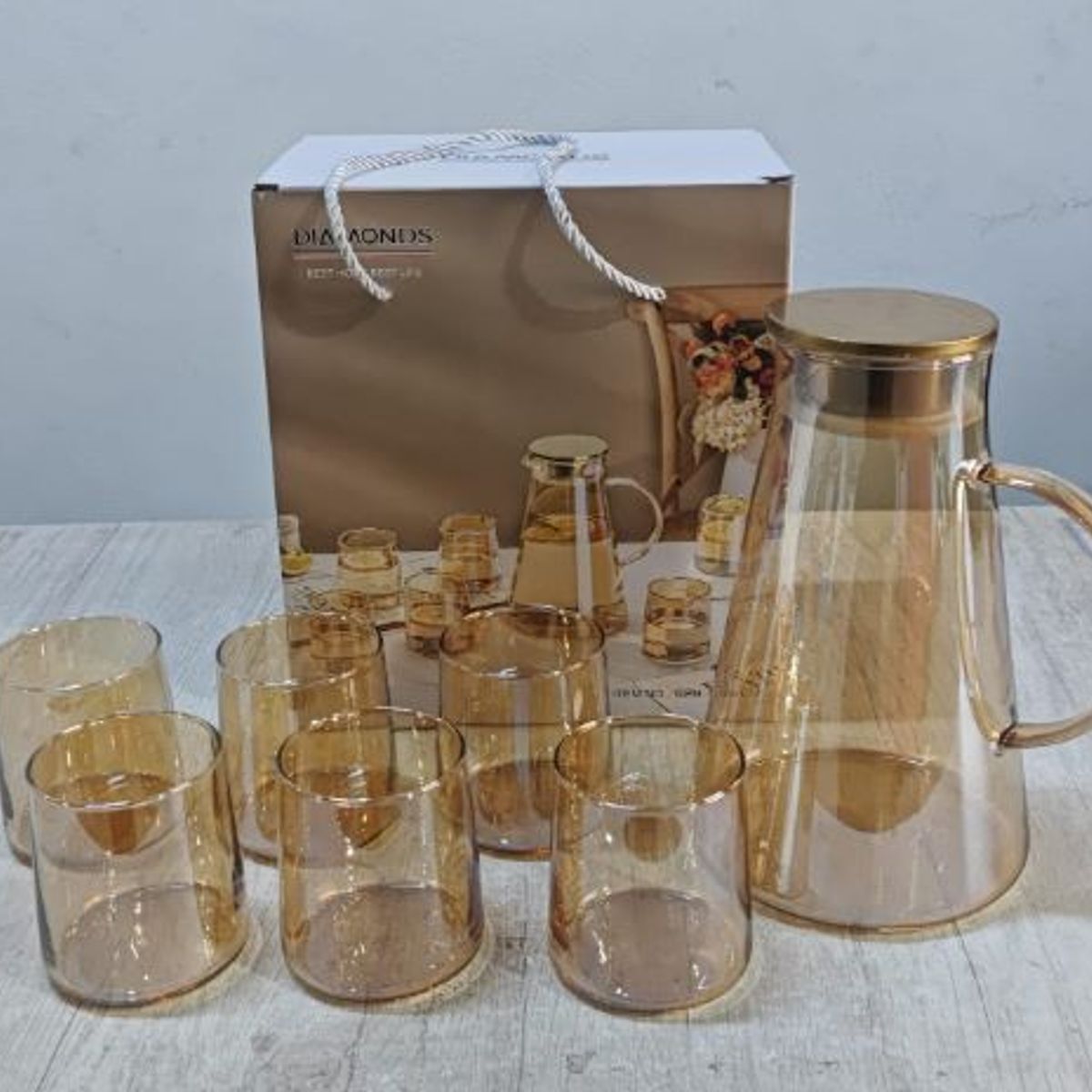 GENERICO - Pack Jarra con 6 Vasos de Vidrio Dorado Resistentes al Calor