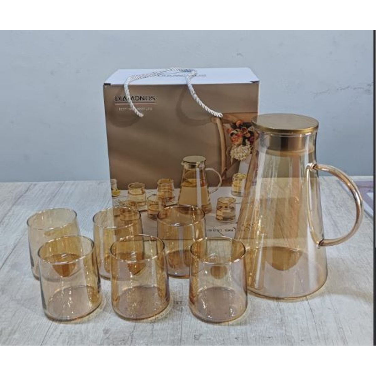 GENERICO - Pack Jarra con 6 Vasos de Vidrio Dorado Resistentes al Calor