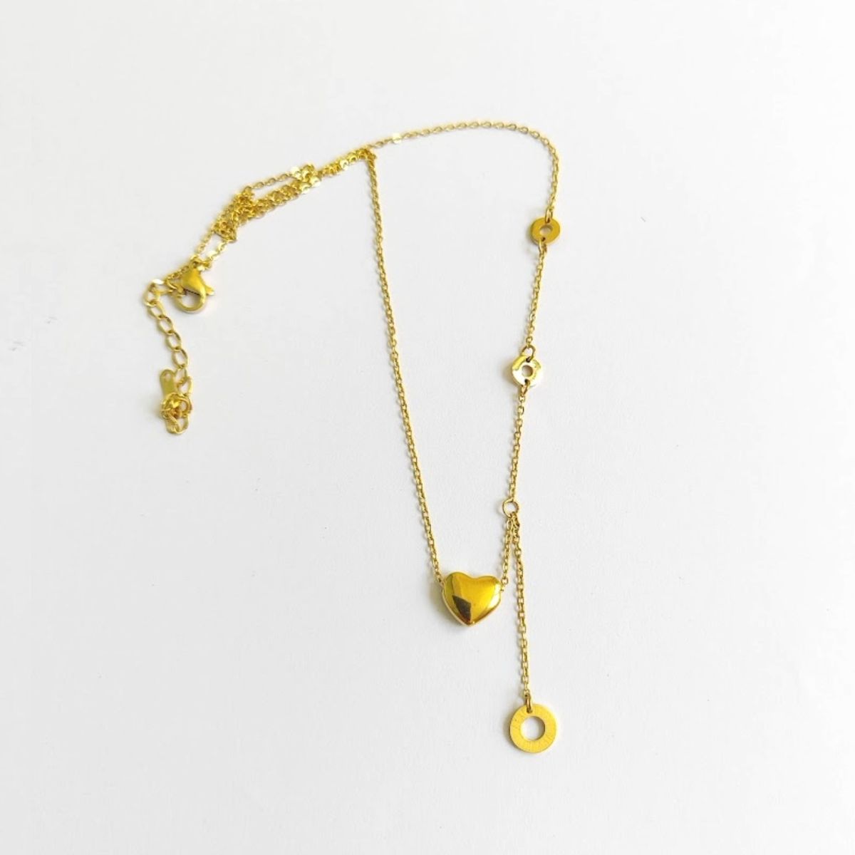 GENERICO - Collar Dorado con Dije de Corazón Bombeado y Aro Colgante  Accesorio Elegante y Moderno para Mujer