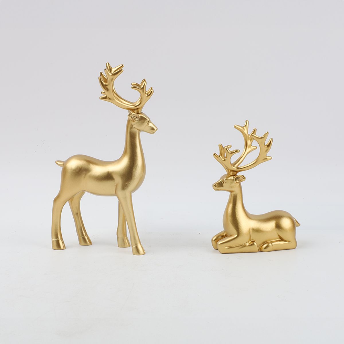 PIA COPELLO STORE - Adorno Pareja de Siervos Dorados