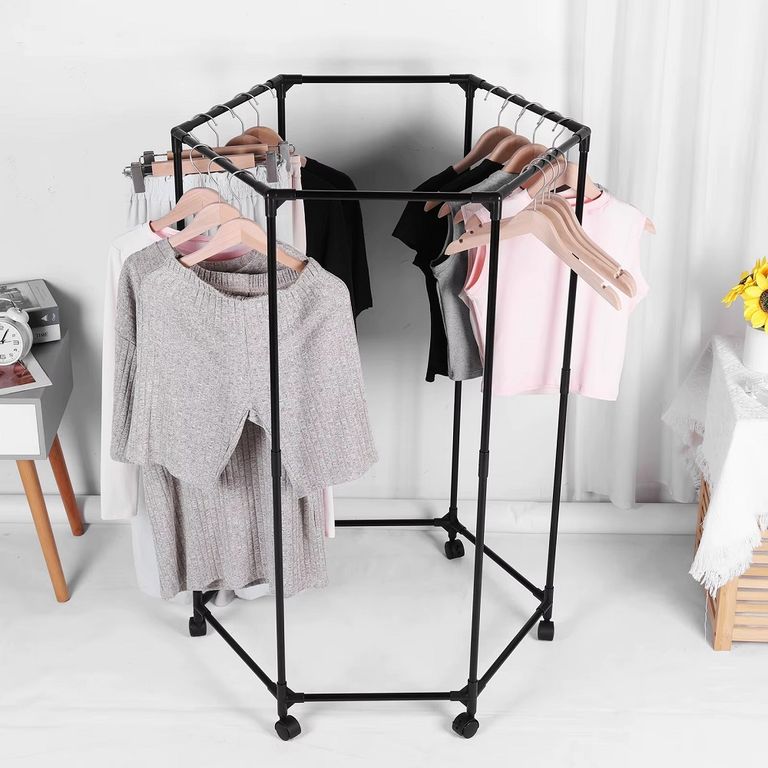 Estante de ropa giratorio hexagonal con ruedas organizador de metal ...