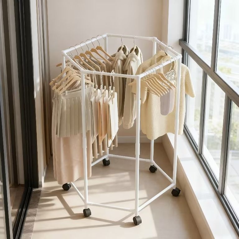 Estante de ropa giratorio hexagonal con ruedas organizador de metal ...