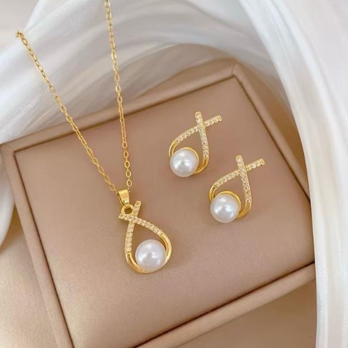 GENERICO - Collar y aretes perla en infinito