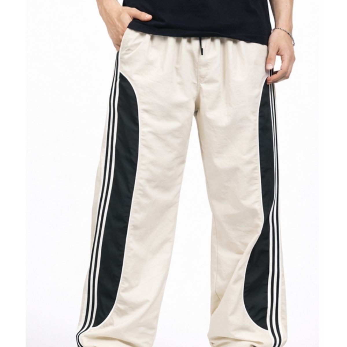 ENKI - Pantalón Power Track Oversized Tela Mojada Hueso Hombre