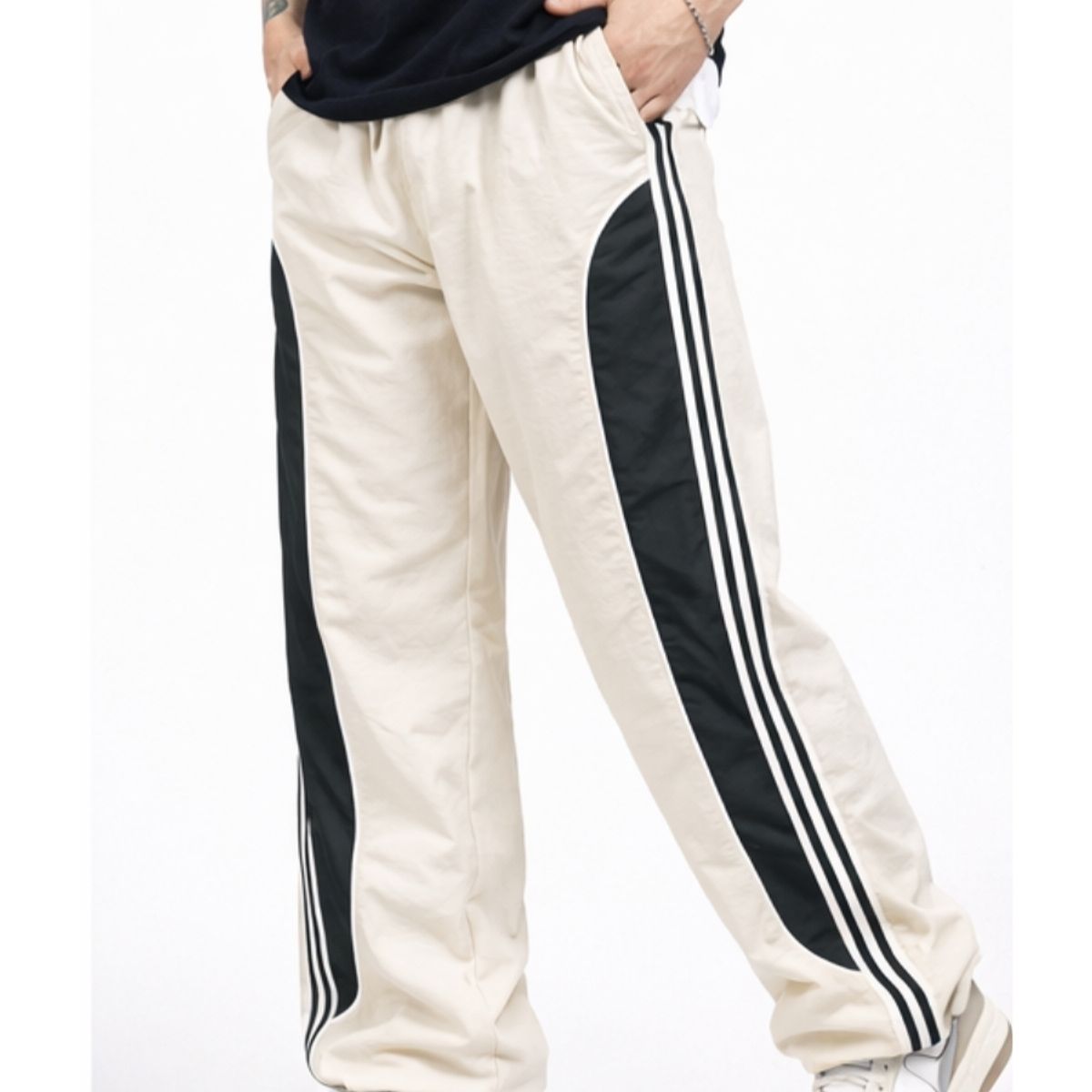 ENKI - Pantalón Power Track Oversized Tela Mojada Hueso Hombre