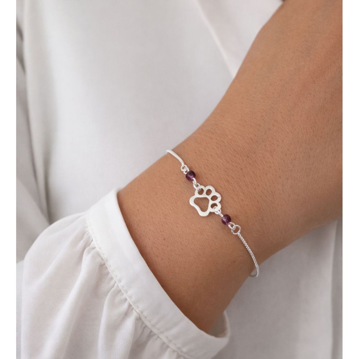 JOYERIA D'PILMER - PULSERA DE PLATA HUELLITA CON CRISTAL COLOR UVA