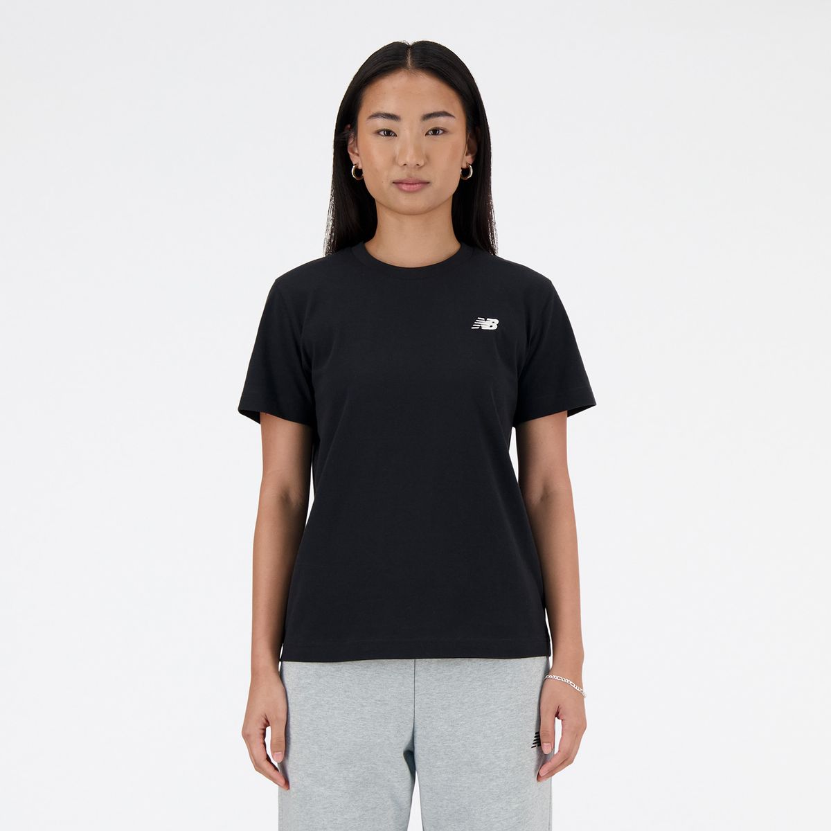 NEW BALANCE - Polo Mujer Sport Essentials Jersey Negro
