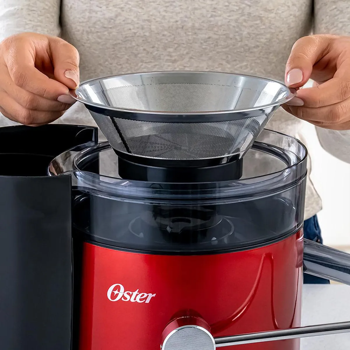 OSTER - Extractor de jugos 1.25 lt Oster FPSTJE320R rojo