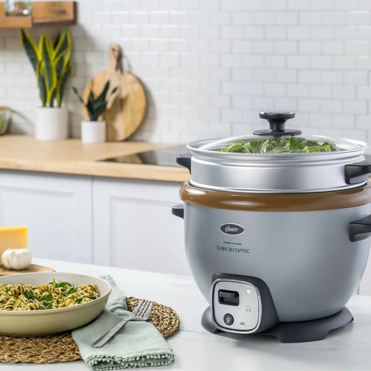 OSTER - Arrocera multiusos 2.2 lt Oster con función sofrito y Bioceramic CKSTRC7130S