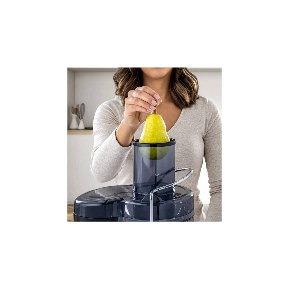 OSTER - Extractor de Jugo de 600 W y 1.25 Lt Capacidad