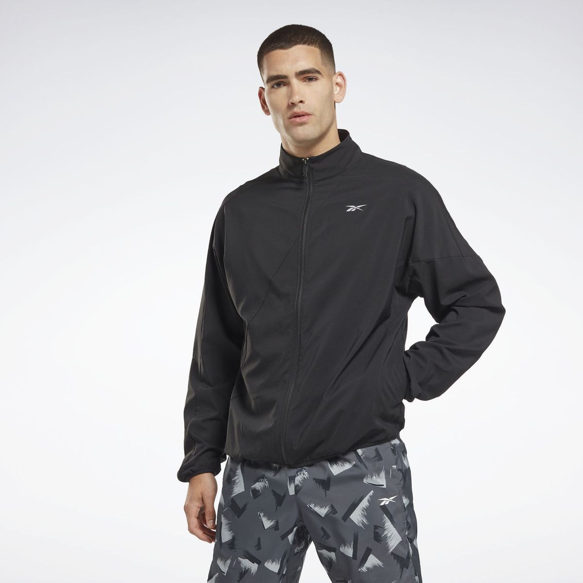 REEBOK - Casaca Cortaviento Deportiva Hombre Reebok