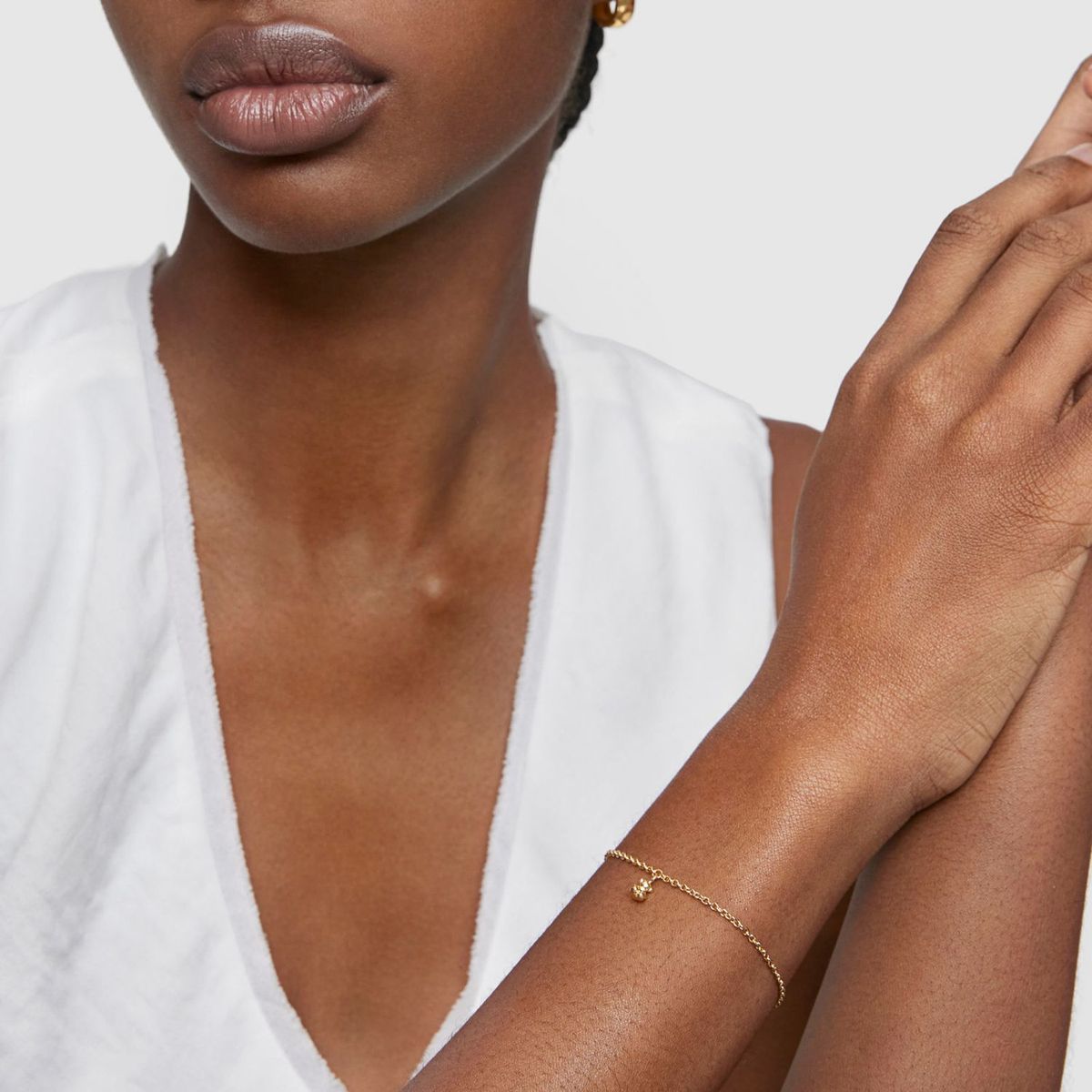 TOUS - Pulsera cadena con baño de oro 18 kt sobre plata y anillas