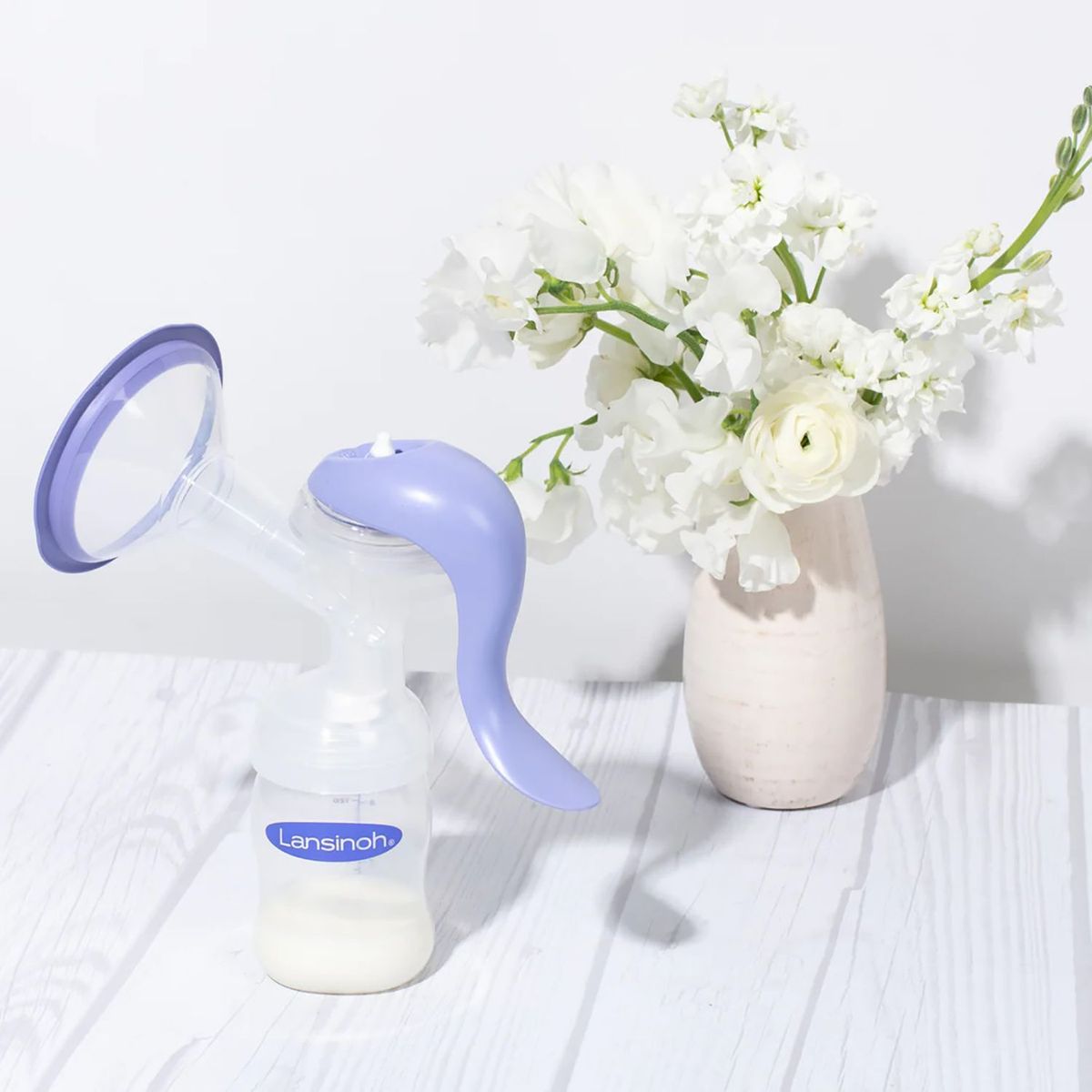 LANSINOH - Pack Extractor Manual De Leche + Bolsas X 25u + Lanolina 7gr + Protector De Pezón