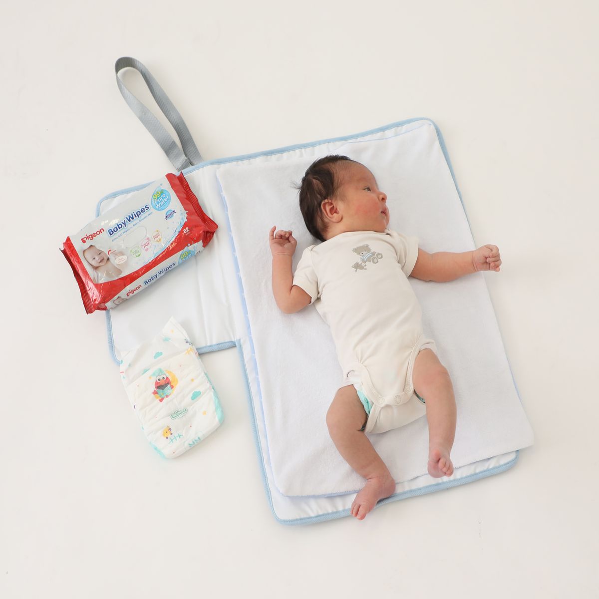 MATERNELLE - Cambiador Convertible en Bolso