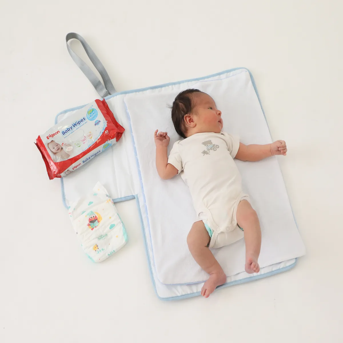 MATERNELLE - Cambiador Convertible en Bolso